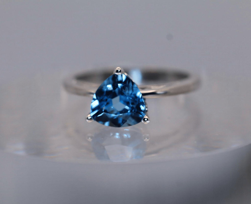 Trillion Blue Topaz Set in Continuum Sterling Mounting