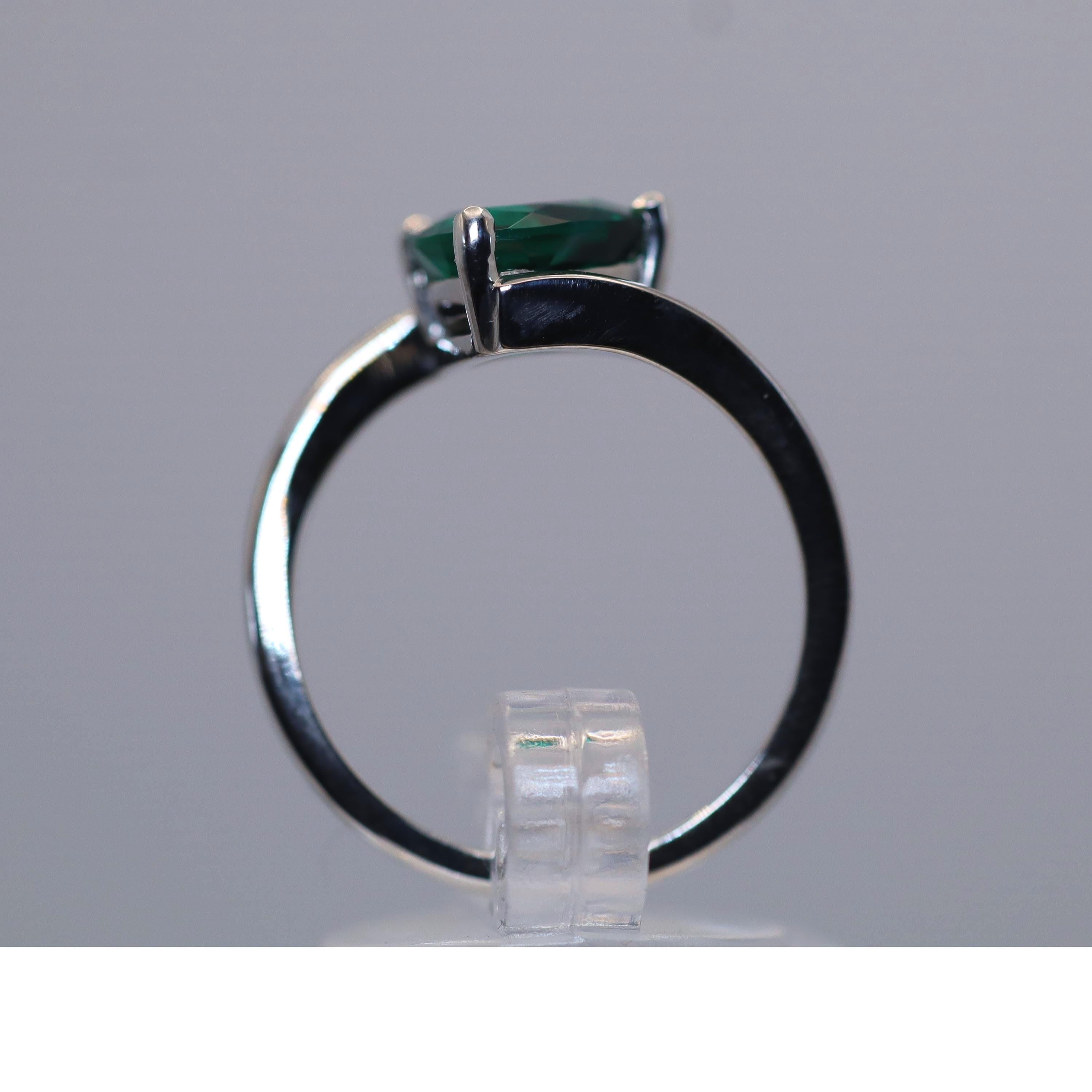 Continuum Silver ring set With Trillion Created Emerald